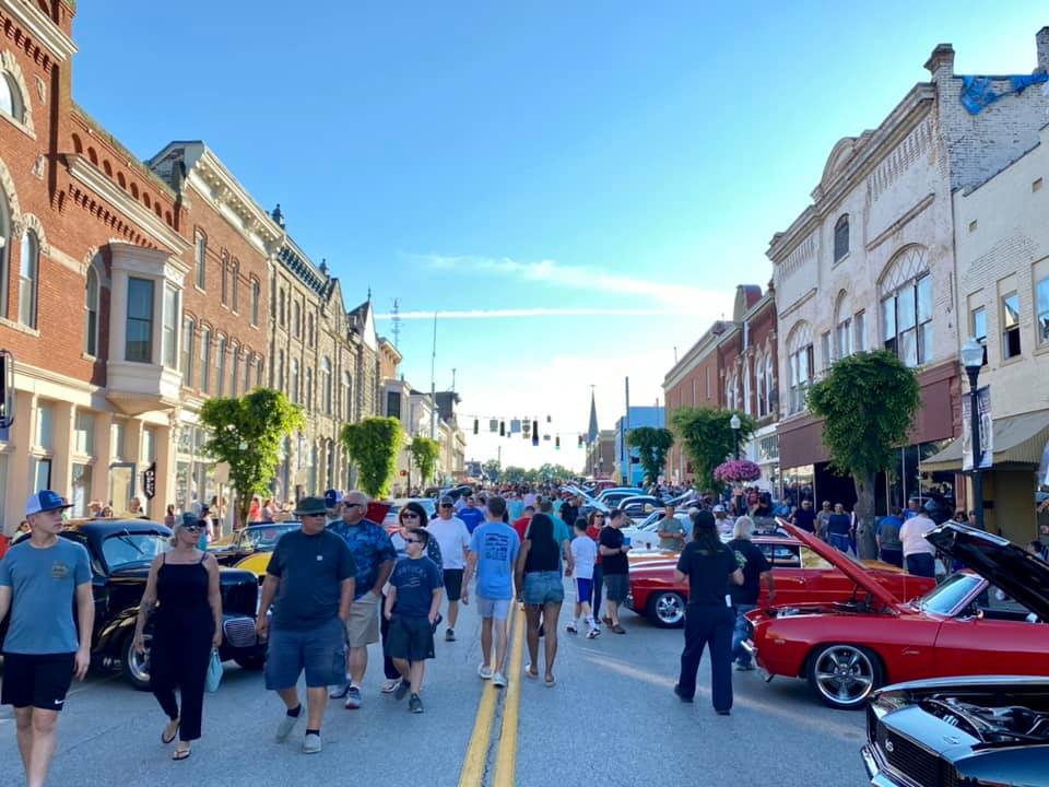 People viewing outdoor car show in downtown Mount Sterling